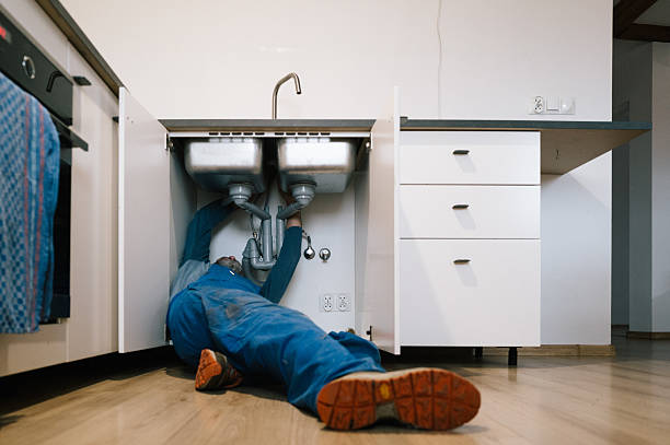 Professional Drain Cleaning technician working in Burlington, ND